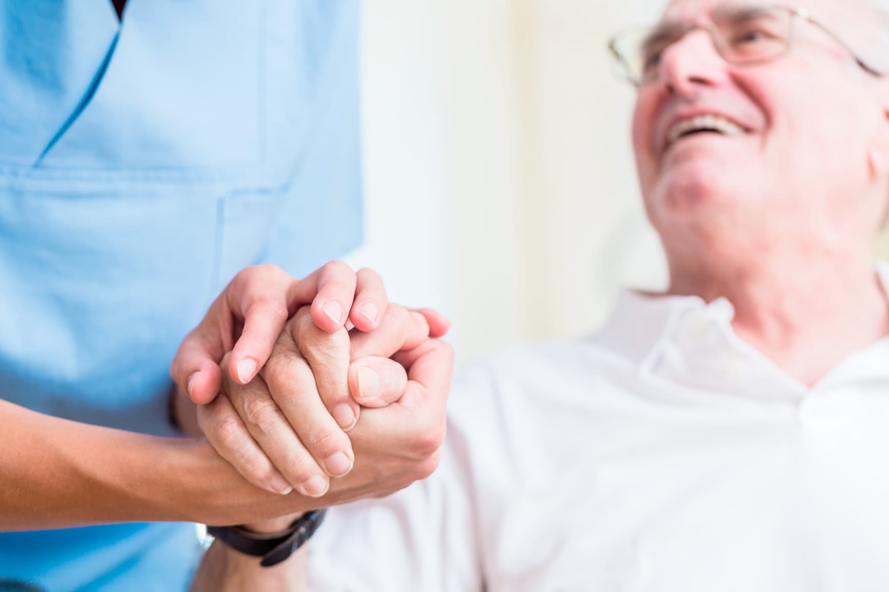 Elderly care situation, smiling man
